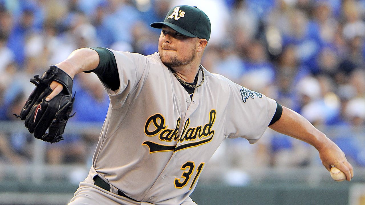 Lester 3-0 since trade, A's tally 20 hits, rout 1st-place Royals 11-3